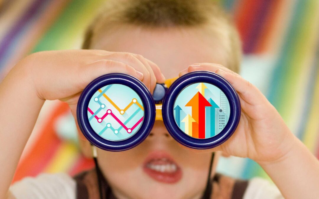 little boy looking through binoculars